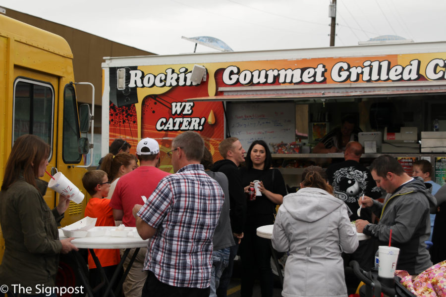 Despite the weather being spotty, many people showed up to enjoy some delicious food (Gabe Cerritos)