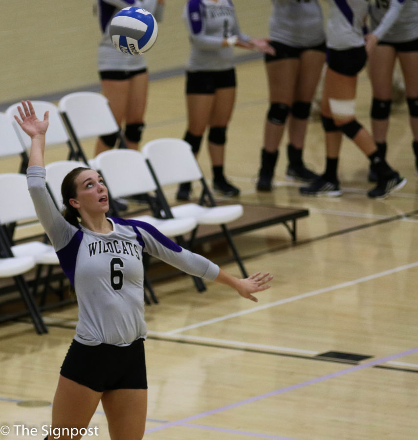 Sophomore Taylor Christensen-Kinikini serving the ball up in the second set. The Wildcats fell to Eastern Washington in straight sets. (Gabe Cerritos / The Signpost).