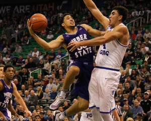Junior guard Jeremy Senglin drives into the lane against the BYU defense. (Gabe Cerritos / The Signpost)