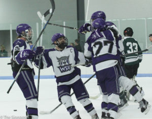 Weber State players get excited about a goal during Saturday's game. (Abby Van Ess / The Signpost)