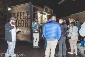 Students line up at the Waffle Wagon after hearing the owner Greg Timothy speak at the Subaru Entrepreneurship Lecture Series. (Christina Huerta/The Signpost)