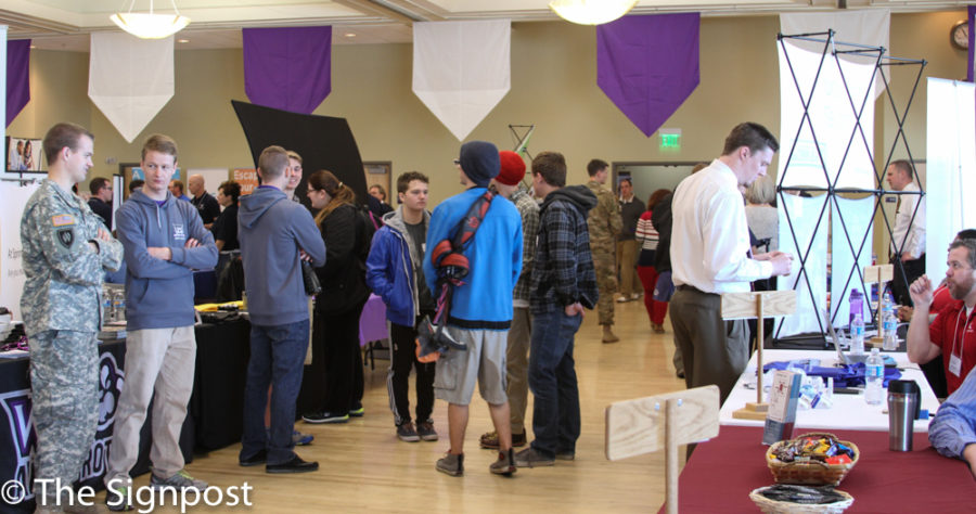 Students explore the different booths at the Career Fair on Tuesday. (Abby Van Ess / The Signpost)