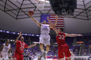Junior Jeremy Senglin finishes with a layup near the basket in Weber State's 77-50 win over Southern Utah University. (Gabe Cerritos / The Signpost)