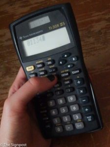 Whether it's basic math or advanced physics, somewhere in a students college career a calculator will be essential. (Photo Illustration by Emily Crooks / The Signpost)