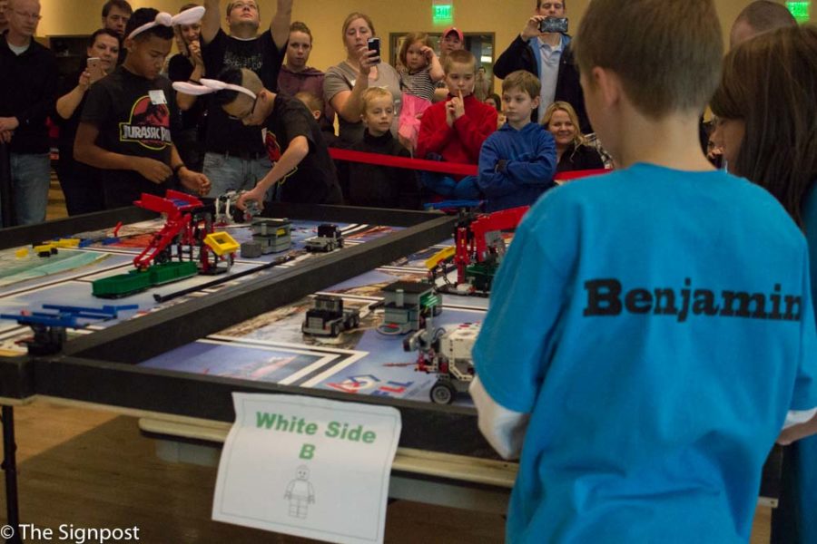 Elementary and junior-high children move through lego obstacles to battle their robots at the FIRST Lego League Qualifier Tournament in the Shepherd Union on Saturday, Jan. 9. The event was hosted by Weber State Universitys College of Engineering, Applied Science & Technology. (Daniel Rubio / The Signpost)