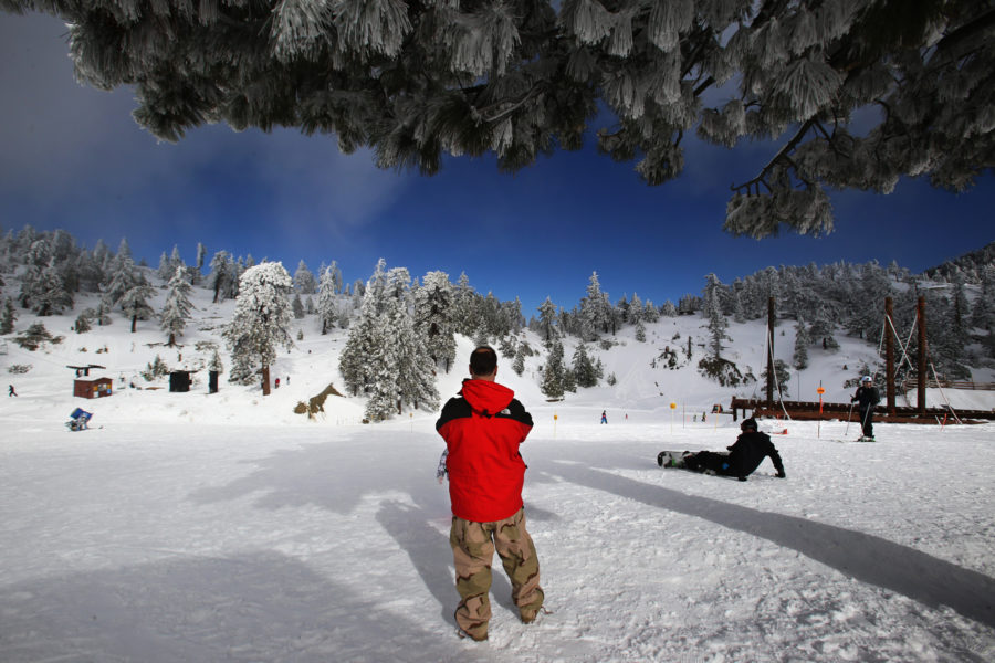 Visitors enjoy the wintery scene created by the recent El Nino storm at the Mount Baldy Ski Are on Jan. 7, 2016. (Genaro Molina/ Los Angeles Times/TNS) Photo credit: MCT & Tribune News Service