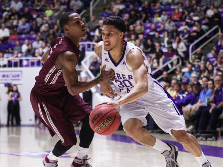 Guard Jeremy Senglin pushes the ball past a Montana player during the Feb 27 game. (Abby Van Ess / The Signpost)