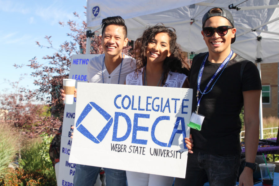 Members of Weber States Collegiate DECA pose at Block Party Fall 2015. WSUSAs new Weber Storm program will promote student involvement around campus. (Cydnee Green / The Signpost)