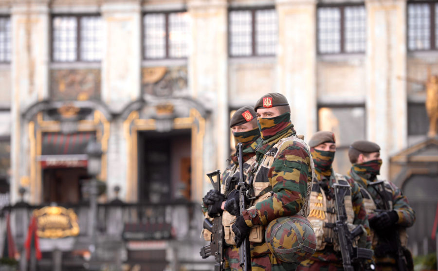 Soldiers and police patrol the city center on Nov. 23, 2015 in Brussels, Belgium. The terrorist threat level is being kept at level four, the maximum, for the time being in Brussels region, and has be maintained at level three for the rest of the country. All schools in Brussels and the subway stay closed. (Jakub Dospiva/CTK/Zuma Press/TNS)