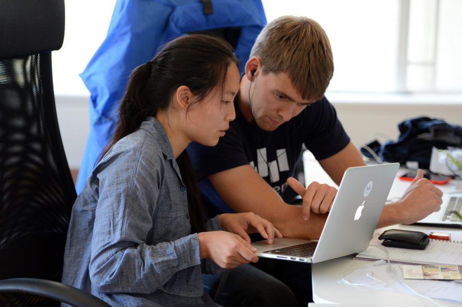 Transcense COO and cofounder Pieter Doevendas, right, works with intern Lutetia Li at the companys office in Oakland, Calif., on July 27, 2015. Transcense is developing an app that is a smart captioner for people with hearing loss. (Kristopher Skinner/Bay Area News Group/TNS)