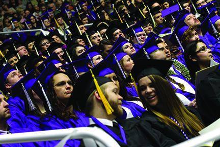Graduates from Fall 2015 fill the Dee Events Center. Students who plan to graduate on April 29 will be able to pick up their caps and gowns on April 19 at Gradfest. (Signpost archive photo)