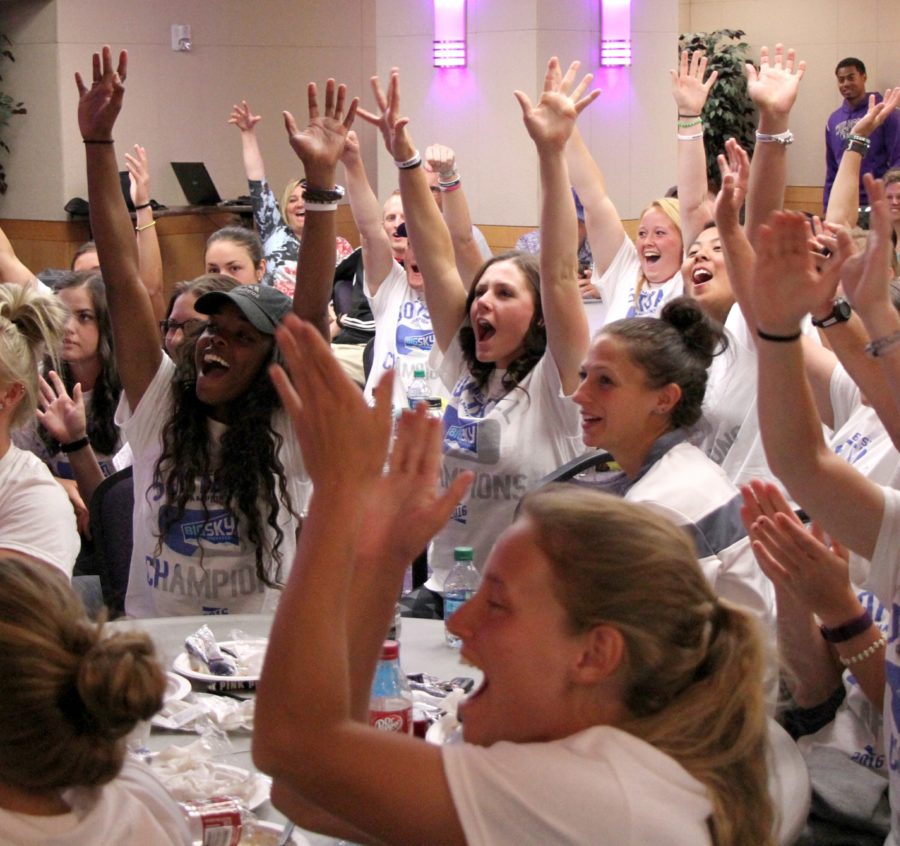 The Weber State University softball team cheers after learning where they will be playing in the NCAA Softball Tournament. Photo credit: Michael Grennell