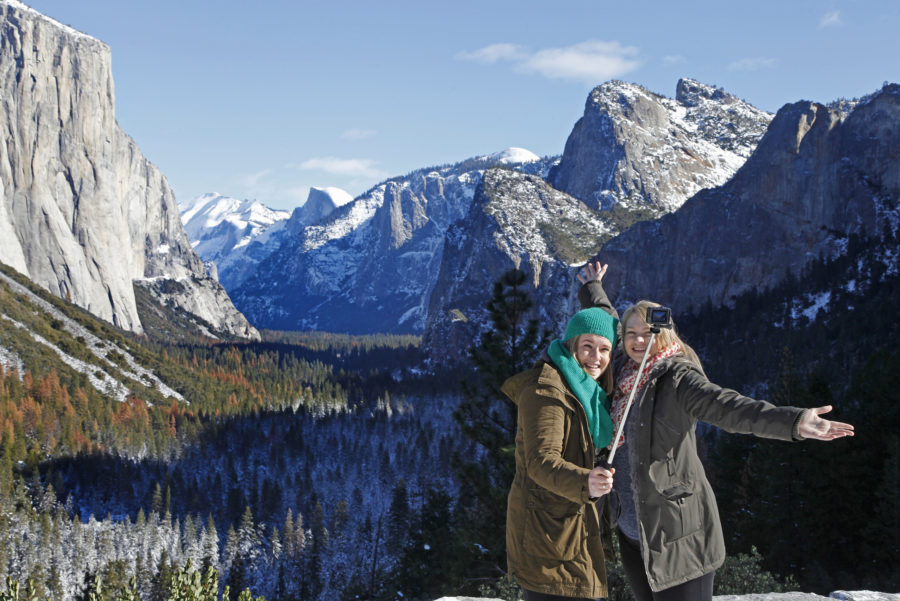 Sarah Selwood, left, and Ashley Wilson from Australia take a selfie at Tunnel View in Yosemite National Park, Calif., on December 30, 2015. (Laura A. Oda/Bay Area News Group/TNS) Photo credit: MCT