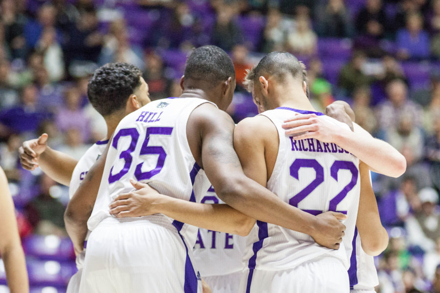 The Weber States Mens basketball team huddles up during the penultimate home game against Montana State last season. (Christina Huerta / The Signpost)