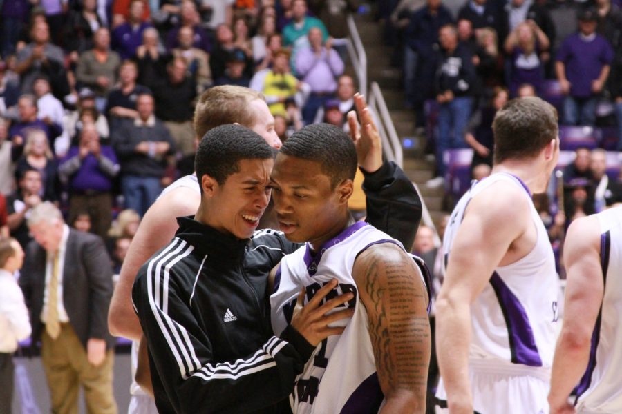 Damian Lillard is hugged by a teammate in a game against Utah State University in Fall 2011. (Signpost Archives)