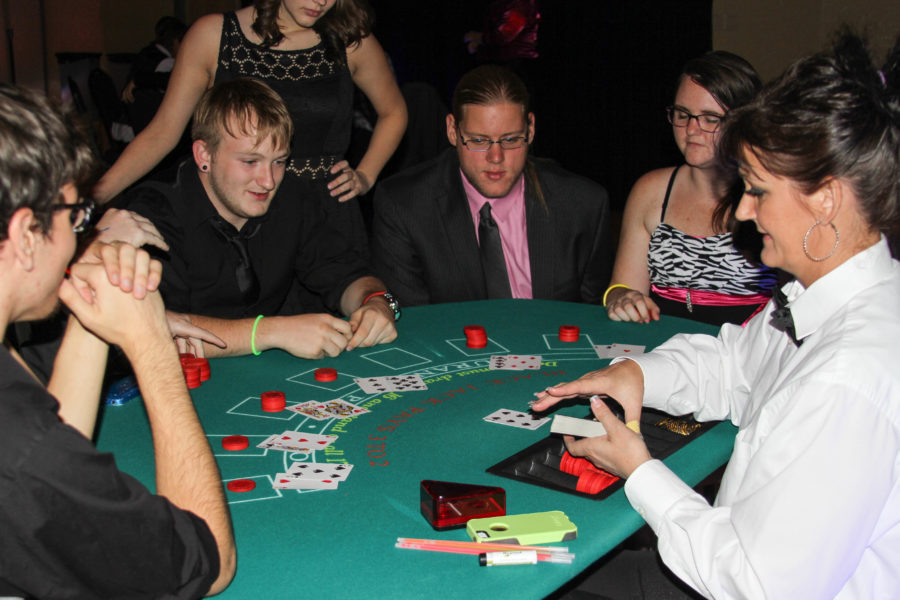 Weber State University students gamble at last years Homecoming dance. (The Signpost Archives)