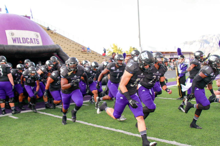 Weber State Universitys football team runs on to the field in their first home game vs. Sacramento State on Sept 17. (Dalton Flandro / The Signpost)
