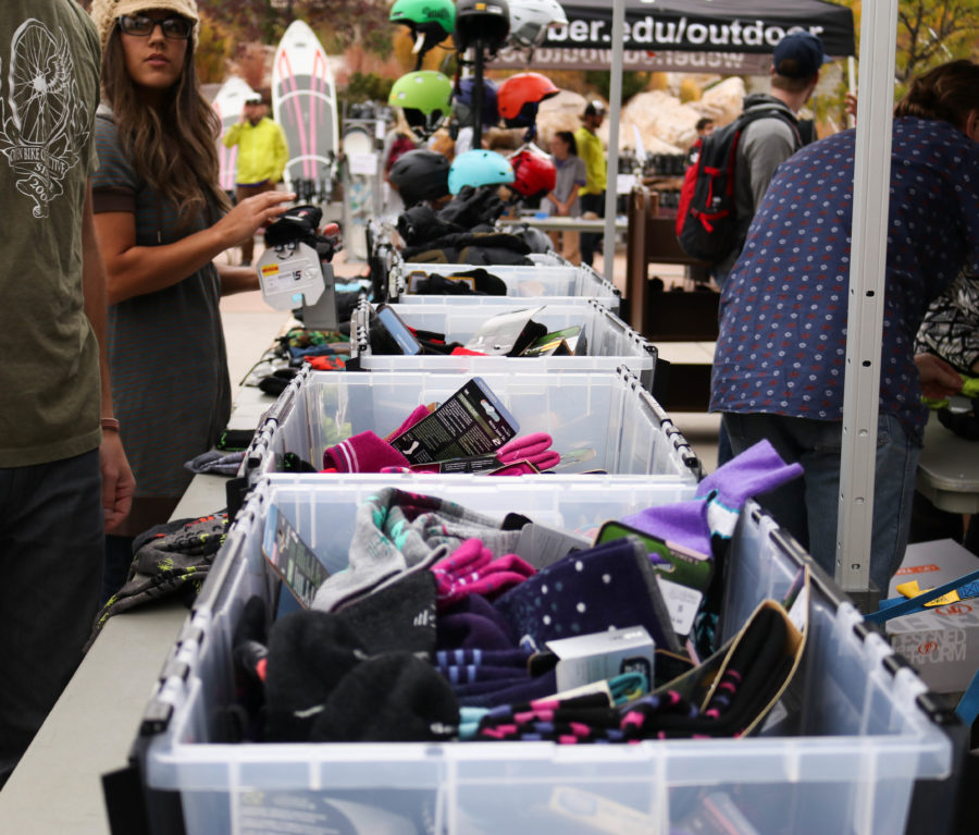 Bins of gloves, hats and mittens are on sale at Gear Sale and Swap at Weber State University on Oct. 14. (Abby Van Ess / The Signpost)