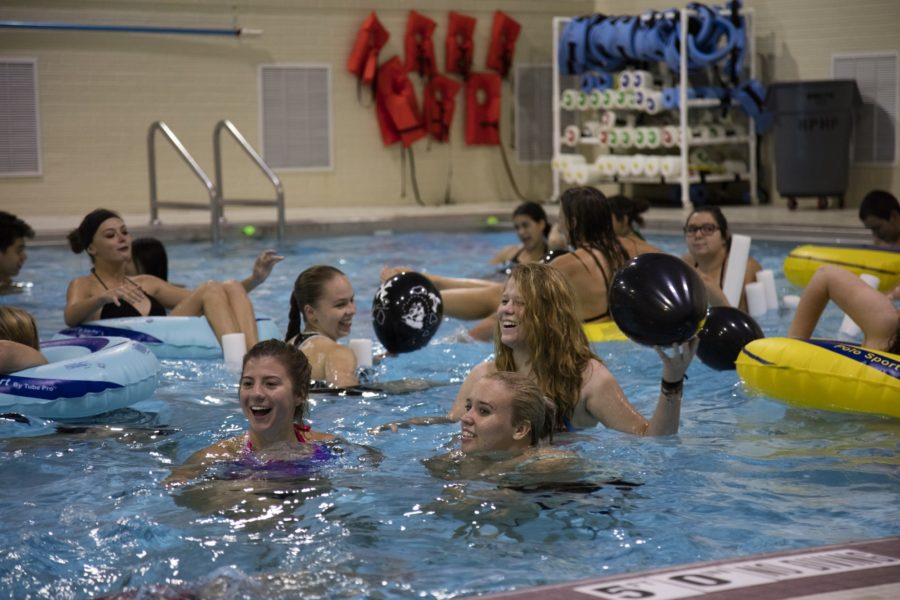 Students swim in the Swenson Pool during the Dive-In movie showing of Pirates of the Caribbean: The Curse of the Black Pearl. (Tara Carrasco / The Signpost)