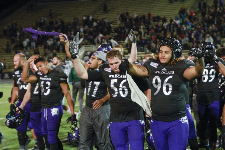Weber State Universitys football team celebrates after winning the Homecoming Game on Oct. 8. (Dalton Flandro / The Signpost)