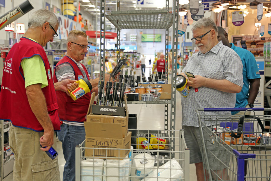 Lowes customers in Florida check out flashlights in preparation for Hurricane Matthew on Oct. 4. (Source: Tribune News Service)