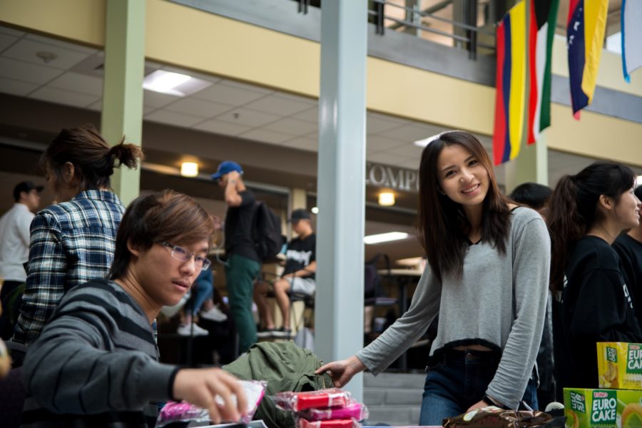 Representatives of the Thailand booth of the International Education Week set up their displays in the Shepherd Union on Nov. 16. (Joshua Wineholt / The Signpost)