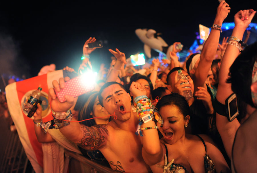 Concert-goers sing and dance to Kaskade at the Kinetic stage at the Electric Daisy Carnival in Las Vegas on Friday, June 19, 2015. (Wally Skalij/Los Angles Times/TNS)