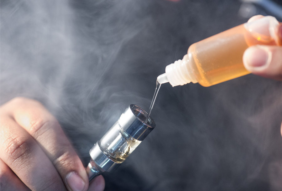 A new study from researchers in Quebec said that e-cigarette vapors kill the cells in the mouth that are the first line of defense. (Source: Tribune News Service) Photo credit: Tribune News Service