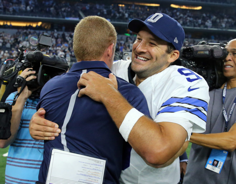 Dallas Cowboys head coach Jason Garrett hugs quarterback Tony Romo (9) after the Cowboys defeated the New York Giants, 27-26, on Sunday, Sept. 13, 2015, at AT&T Stadium in Dallas. (Richard W. Rodriguez/Fort Worth Star-Telegram/TNS)