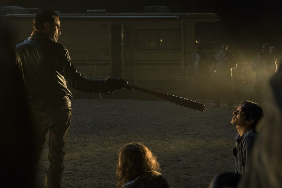 Jeffrey Dean Morgan (left), as Negan, threatens characters in Season 7 of The Walking Dead. (Source: MovieStillsDB)