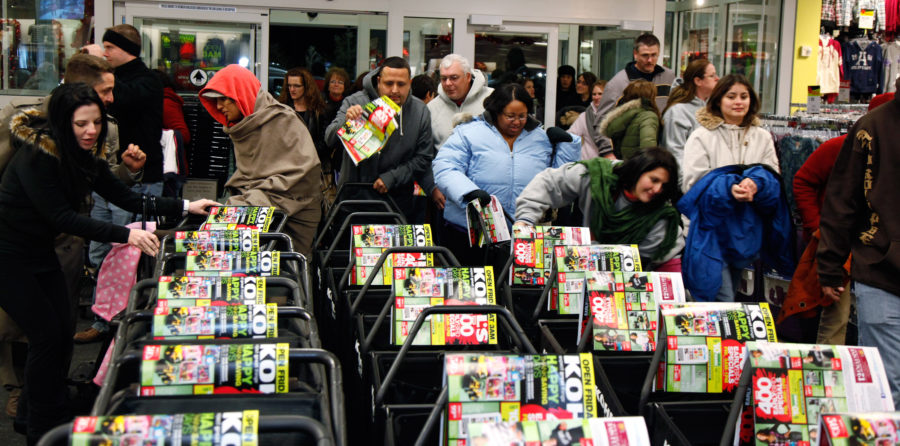 Early bird shoppers rush for the shopping carts at Kohls in Plano, Texas, to take advantage of Black Friday Nov. 2010. (Source Tribune News Service)