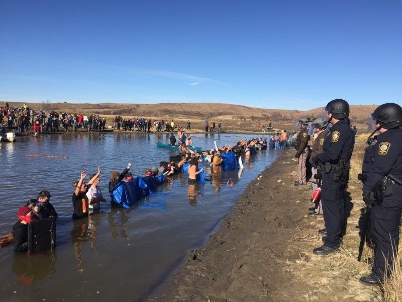 Police from six states have been marshalled by the state of North Dakota to attempt to shut down protests against the Dakota Access Pipeline by tribal members from across the country and their supporters. (Morton County Sheriff’s Office/TNS)
