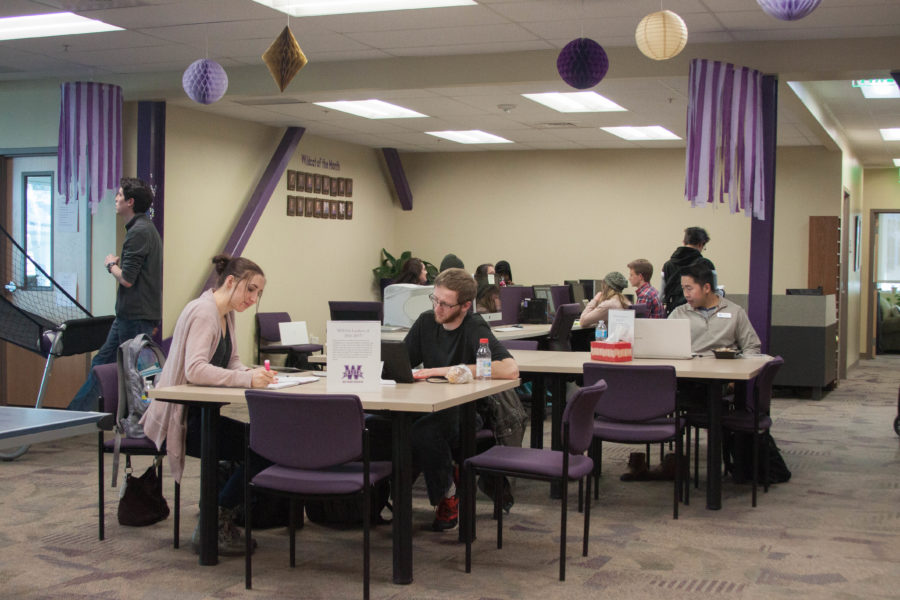 Students work or play in the common area of the Student Involvement & Leadership center on Feb. 21, where the WSUSA Senate is suggested to work following their removal from their office space. (Emily Crooks / The Signpost)