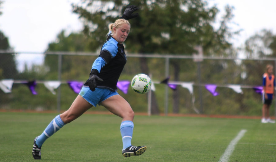 Goalkeeper Sydnie Brough saves the ball from New Mexico in Fall 2016. The womens soccer team signs 10 new Wildcats to their team. (The Signpost Archives)