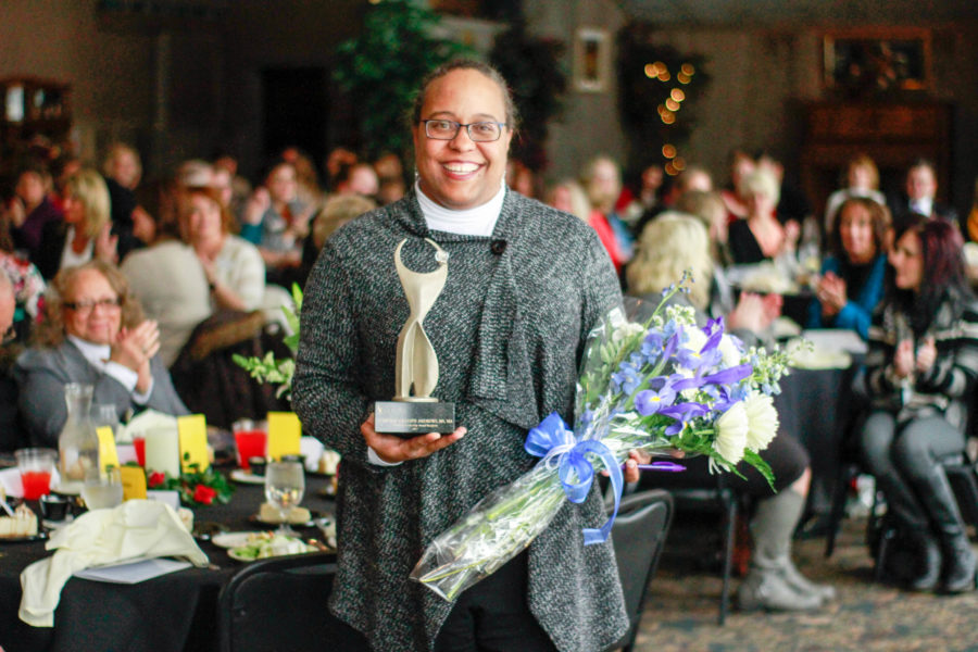 Adrienne Andrews, Chief Diversity Officer at Weber State University, is the recipient of the Athena Leadership Award. She poses with the award at the Athena Awards Ceremony at Timbermine in Ogden on Jan. 24. (Dalton Flandro/The Signpost)