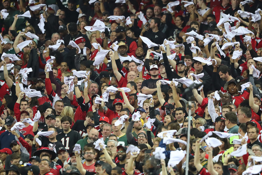 Atlanta Falcons fans celebrate a touchdown pass to Mohamed Sanu for a 7-0 lead over the Green Bay Packers during the first quarter in the NFC Championship game on Sunday, Jan. 22, 2017, in Atlanta, Ga. (Curtis Compton/Atlanta Journal-Constitution/TNS)