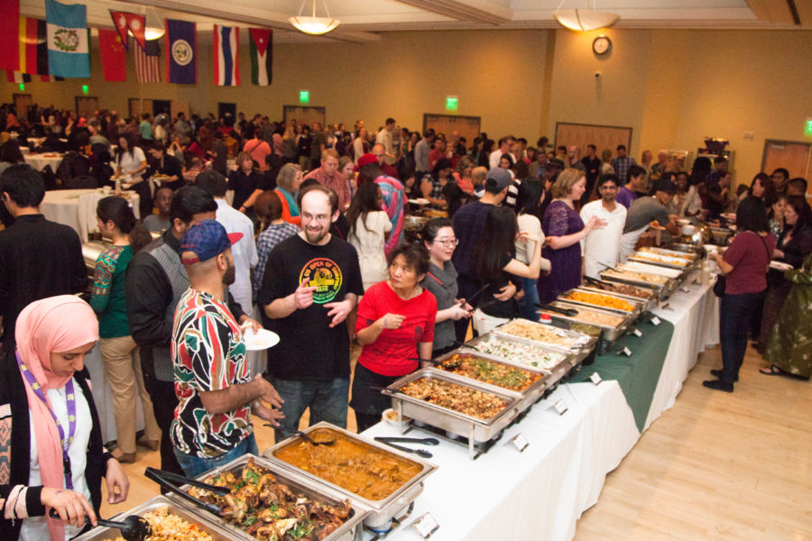 An array of traditional foods from 15 different countries was served at the International Banquet last year. Senate discusses concerns with the upcoming International Banquet, like whether students making or serving food have food handlers permits. (The Signpost Archives)