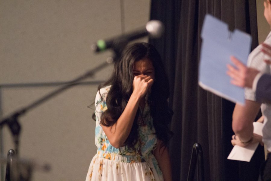 Aulola Moli cries as she comes up on stage after having been announced the 2017-18 WSUSA Student Body President in the Shepherd Union on March 17. (Dalton Flandro / The Signpost)