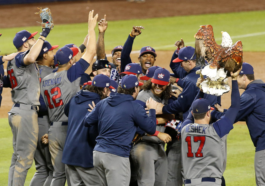 Players from the United States celebrate an 8-0 win against Puerto Rico in the World Baseball Classic championship at Dodger Stadium in Los Angeles on Wednesday, March 22, 2017. (Source: Tribune News Service)