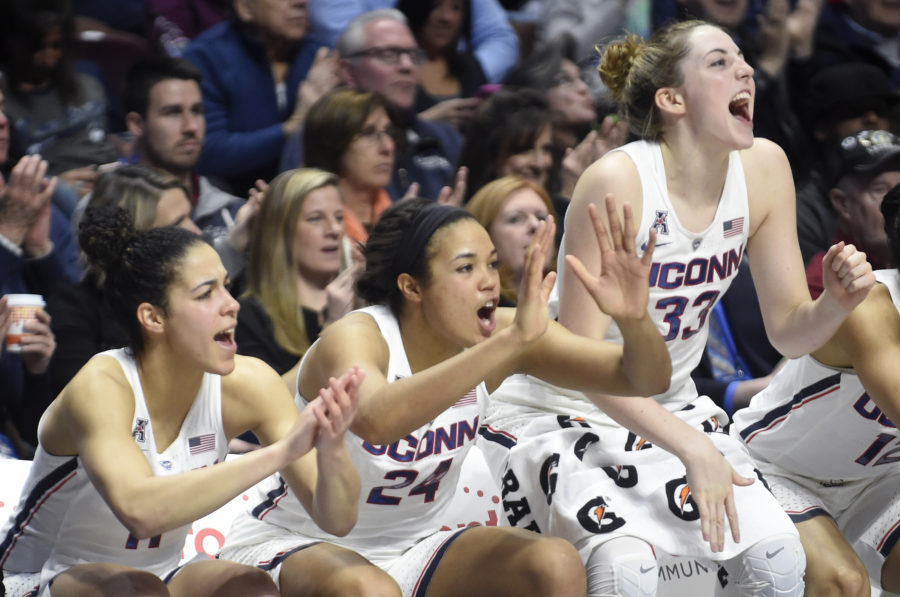 Connecticut Huskies guard Kia Nurse (11), guard/forward Napheesa Collier (24) and guard/forward Katie Lou Samuelson (33) celebrate on the bench during semifinal win over UCF in the AAC Womens Basketball Tournament on Sunday, March 5, 2017 at Mohegan Sun Arena in Uncasville, Conn.  (Brad Horrigan/Hartford Courant/TNS)