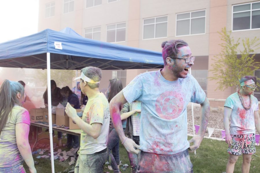 Students are covered in colored chalk following Colorfest at the Davis Campus on March 30. (Dalton Flandro / The Signpost)