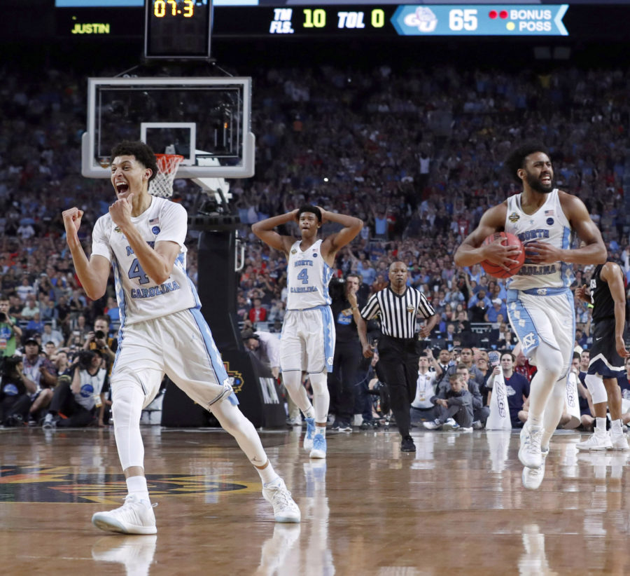 The North Carolina Tar Heels begin to celebrate winning the March Madness tournament at the end of March 2017. (Source: TNS)