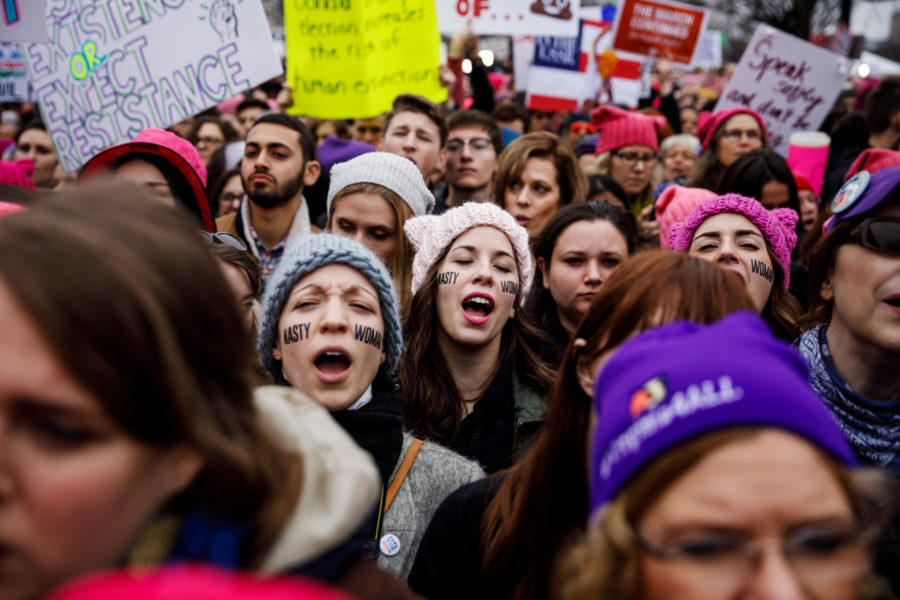 Women sing along as thousands pack the streets for the Womens March on Washington rally outside the National Museum of the American Indian in Washington, D.C., on Saturday, Jan. 21, 2017. A new study has found that social and structural barriers continue to obstruct the advancement of female members of Generation X and millennials. (Marcus Yam/Los Angeles Times/TNS)