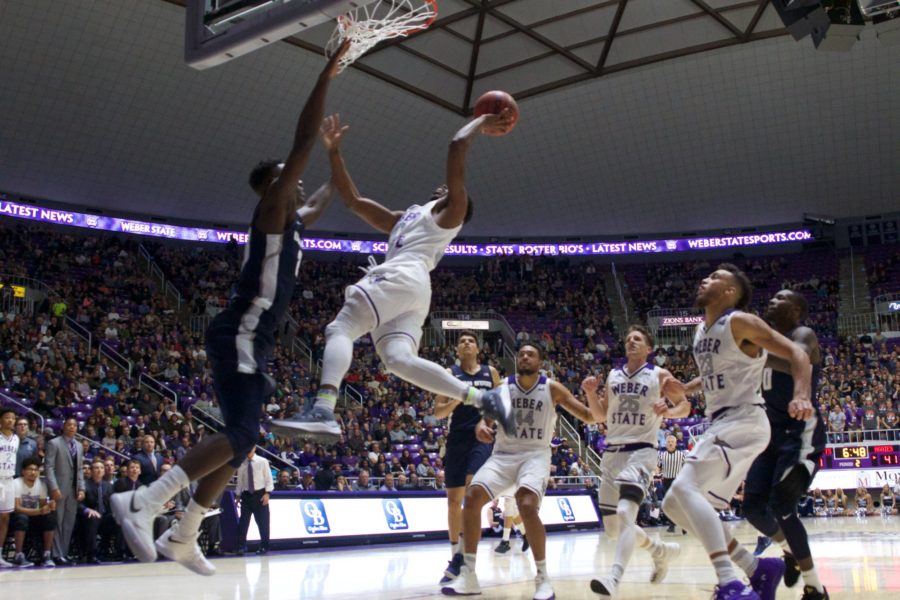 Wildcats outlast Utah State in opening-night rout