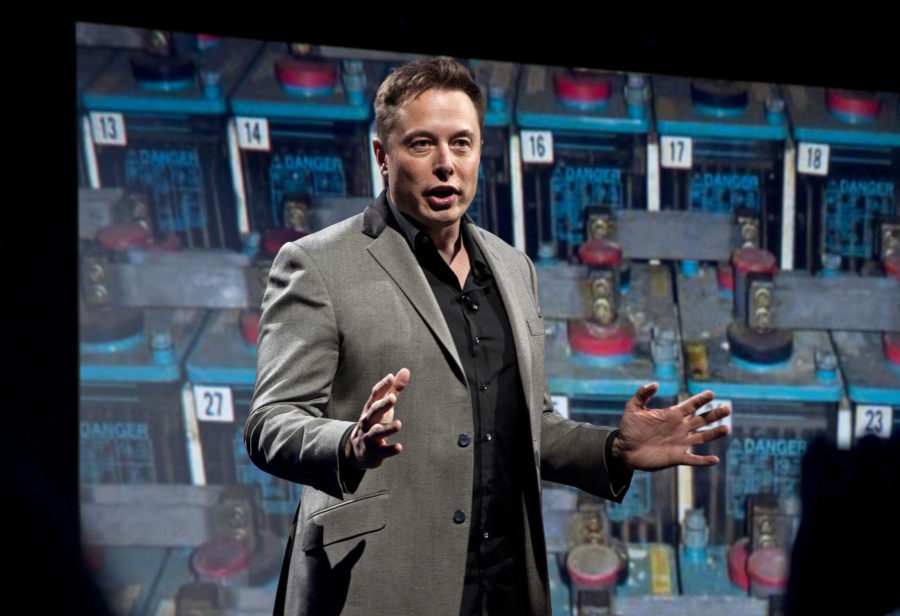 In this April 30, 2015 file photo, Tesla Motors CEO and SpaceX CEO and CTO, Elon Musk, introduces a new line of residential and commercial batteries at his design studio in Hawthorne, Calif. (Jerome Adamstein/Los Angeles Times/TNS)