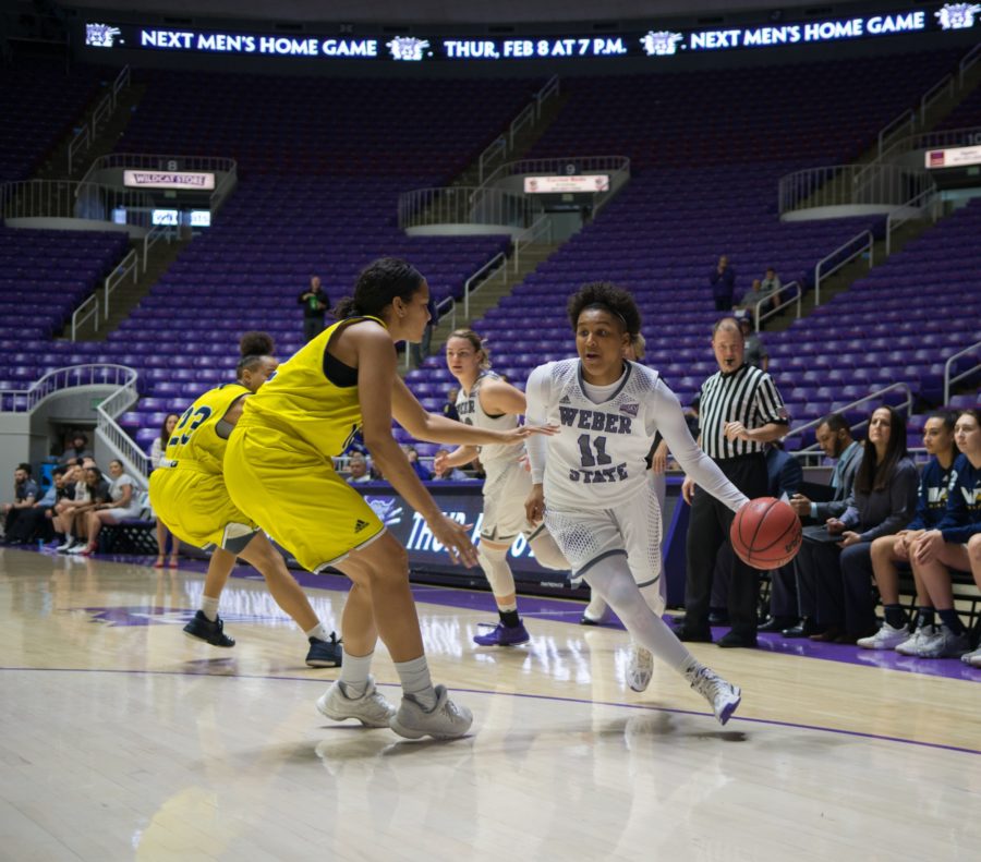 Larryn Brooks, guard for the Wildcats, looks for an opening to drive to the basket. (Joshua Wineholt / The Signpost)