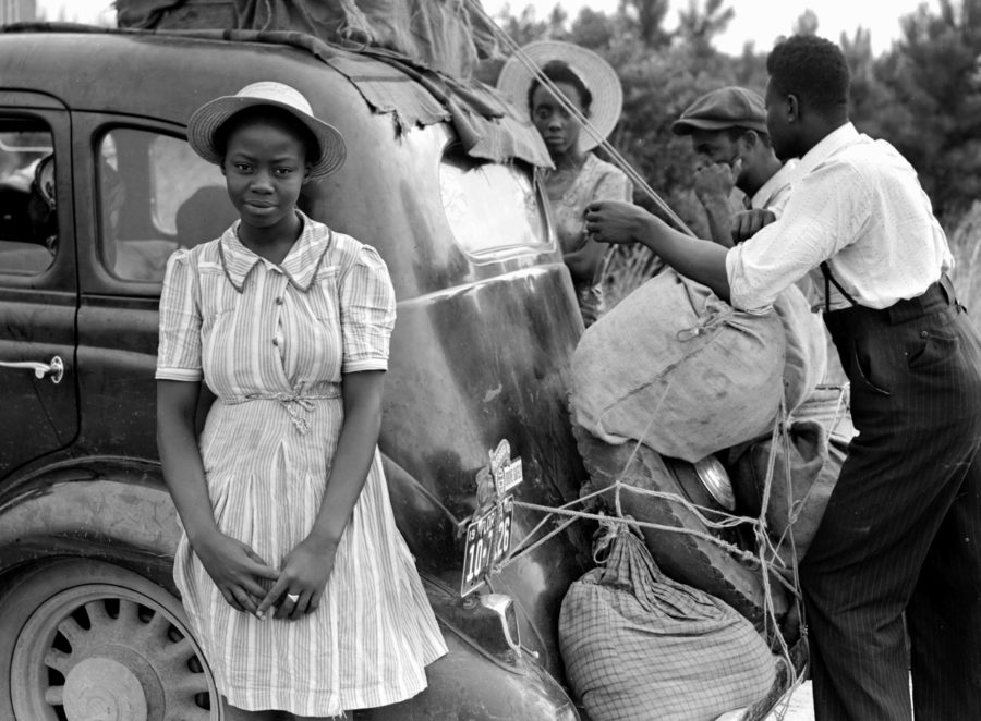 Group of Florida migrants on their way to Cranberry, New Jersey, to pick potatoes. Near Shawboro, North Carolina          July 1940      Jack Delano      fsa.8c35333      FSA/OWI Photo credit: Wikimedia Commons