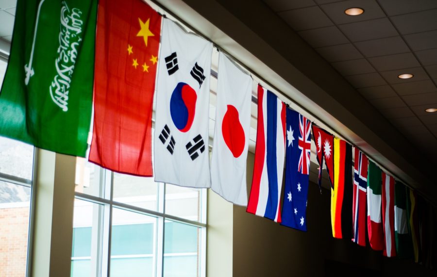 Flags from all different countries hang on either side of the banquet. (Joshua Wineholt / The Signpost)