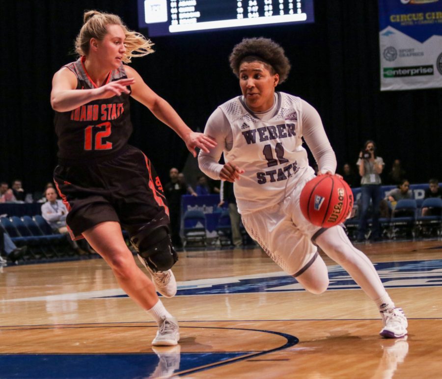 Senior Larryn Brooks attempts to get past Idaho State player Brooke Blair during the quarterfinal game of the Big Sky Championship.  (Ariana Berkemeier / The Signpost)