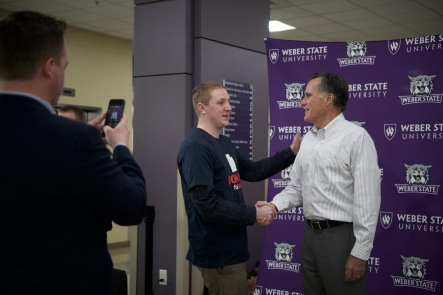 Senate candidate, and former presidential hopeful, Mitt Romney meets and has his photo taken with students. (Joshua Wineholt / The Signpost)